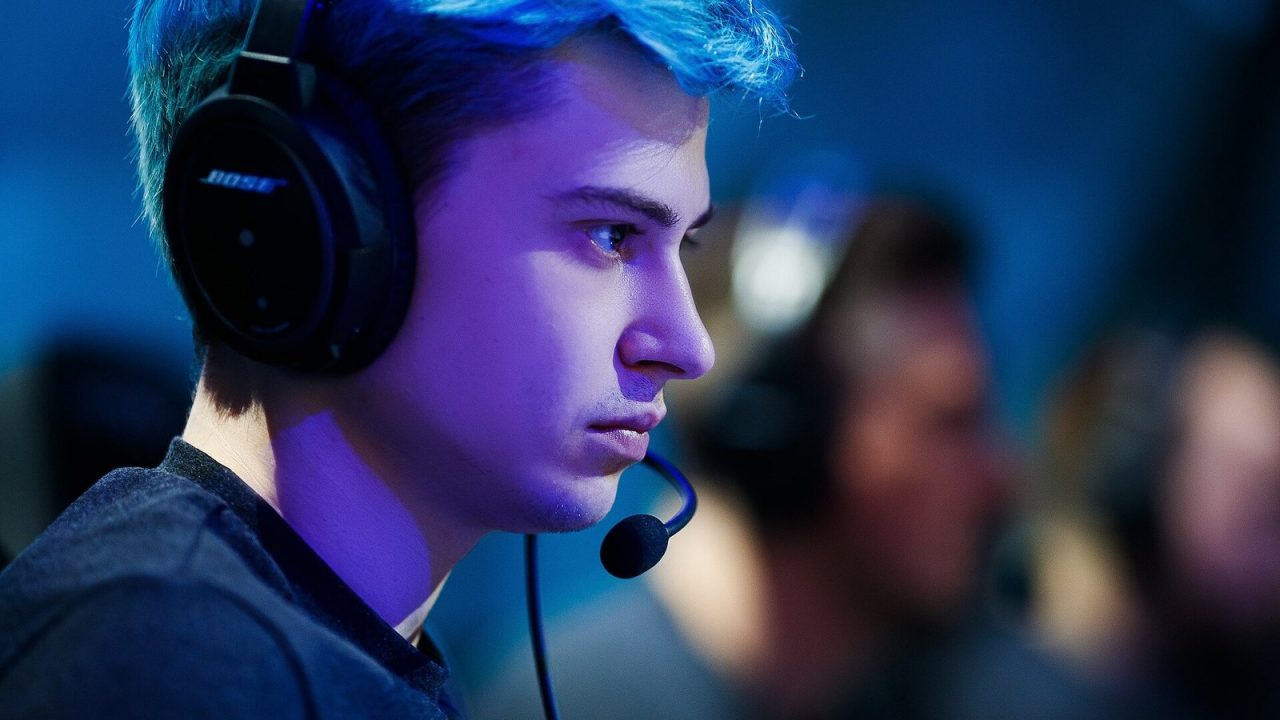 Professional player RAMZES666 playing Dota 2 at a tournament PC