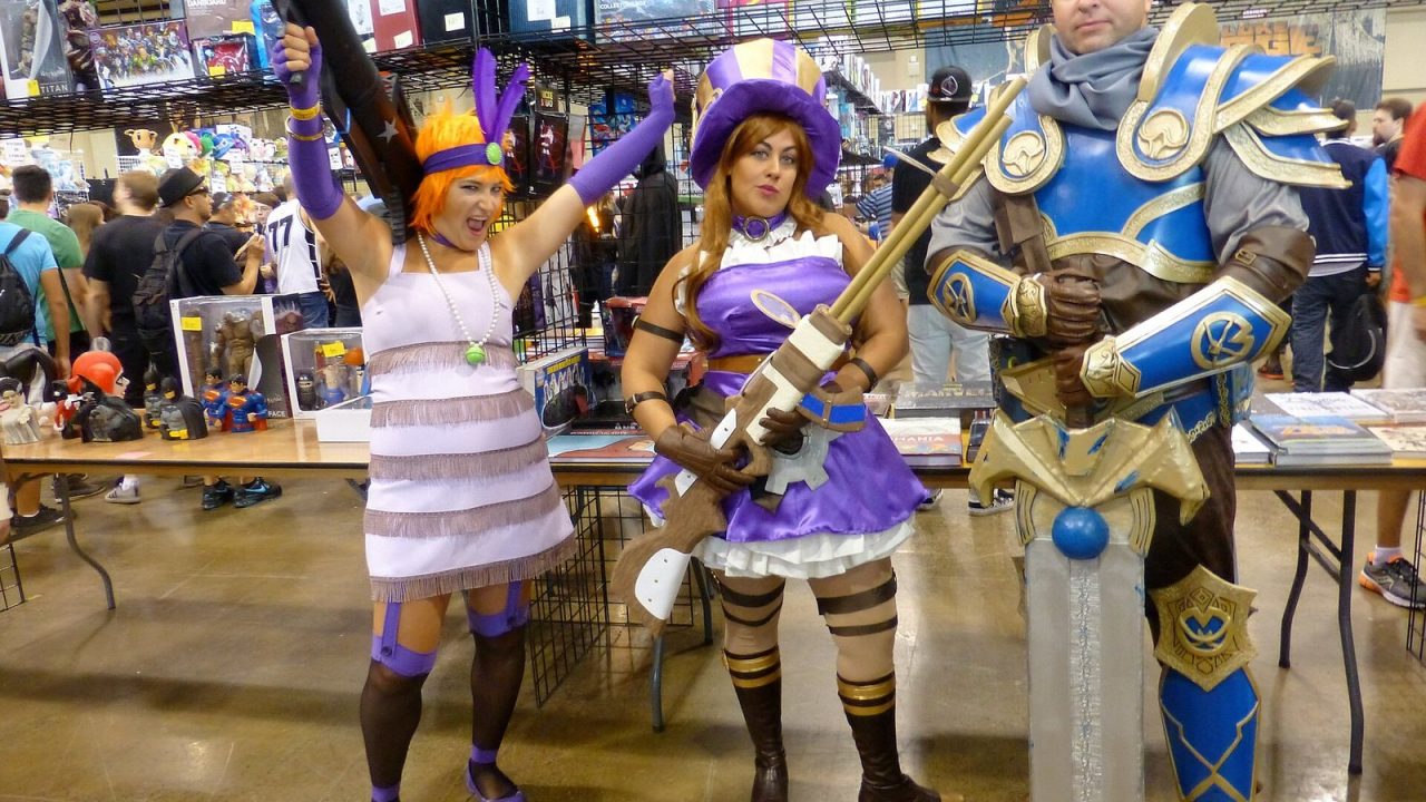 Cosplayers dressed as Jinx, Miss Fortune and Garen from League of Legends at Fan Expo Canada 2016