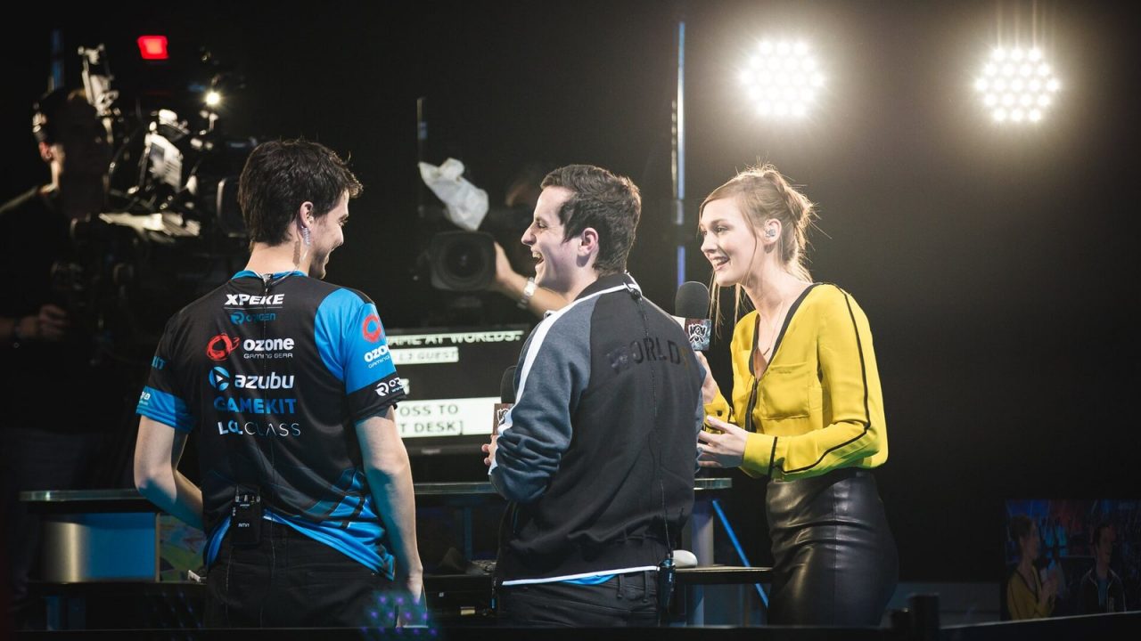 Team playing on stage at the 2015 League of Legends World Championship group stage